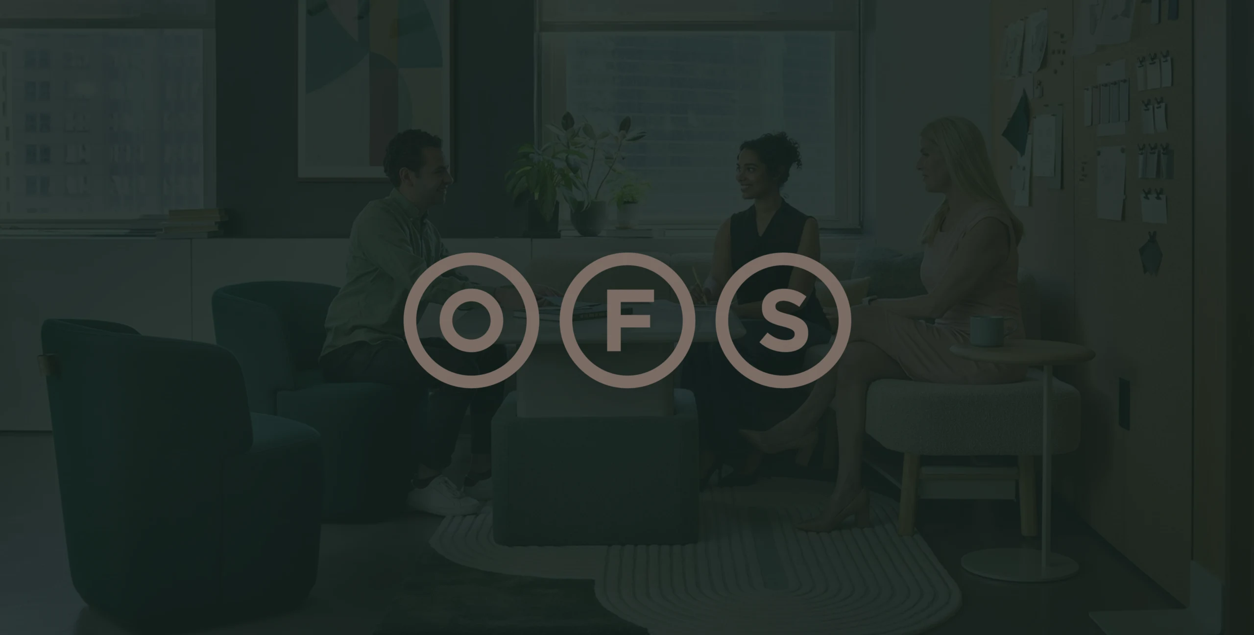 OFS logo over a darkened OFS-furnished meeting space